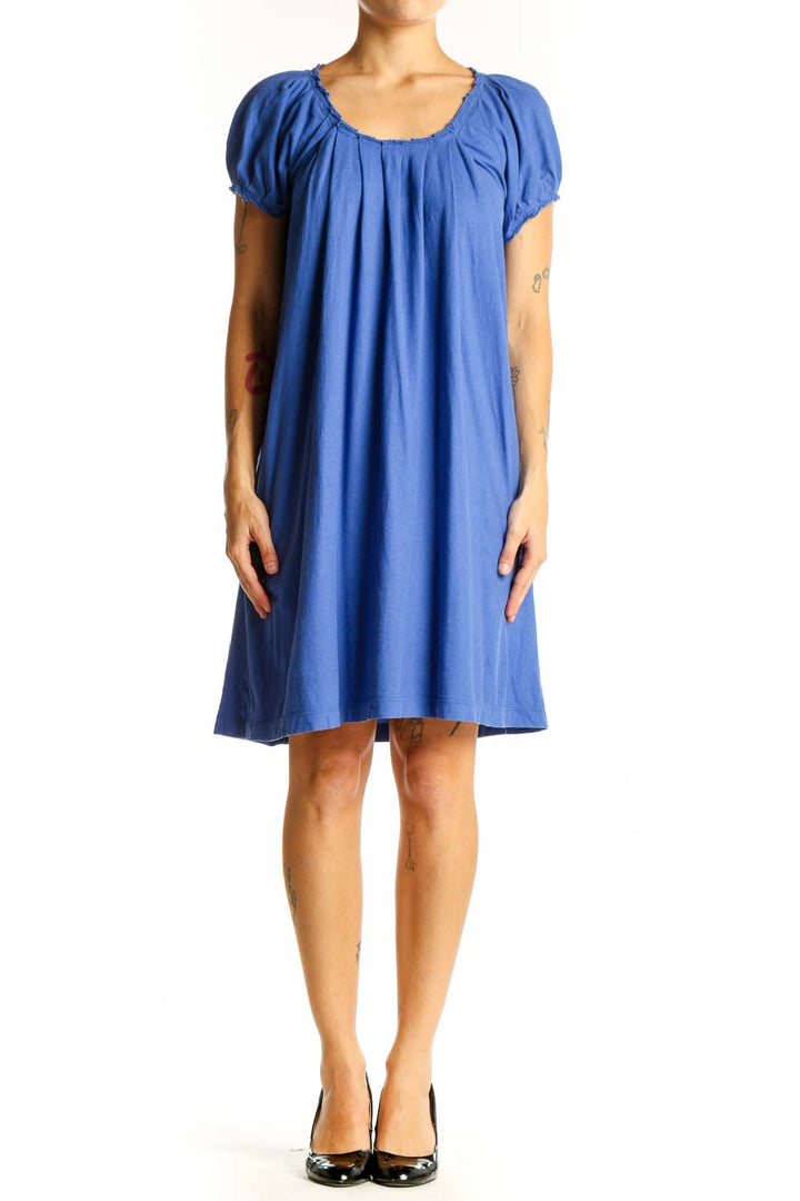 Front view of J.Crew blue flowy tunic top with short puffed sleeves