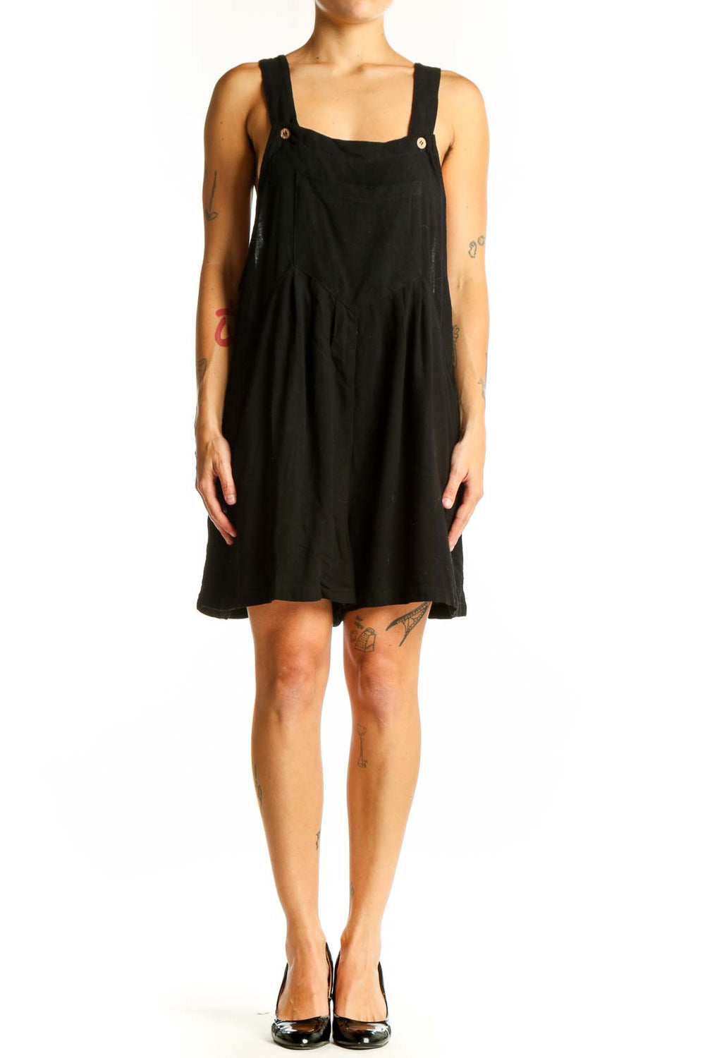Front view of Arabess black sleeveless overalls dress with square neckline