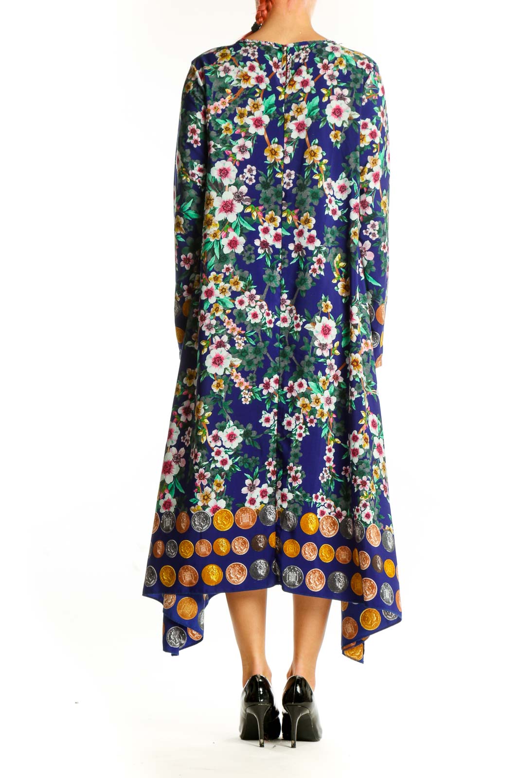 Side view of Organic Topless blue floral print midi dress showing long sleeves and coin border