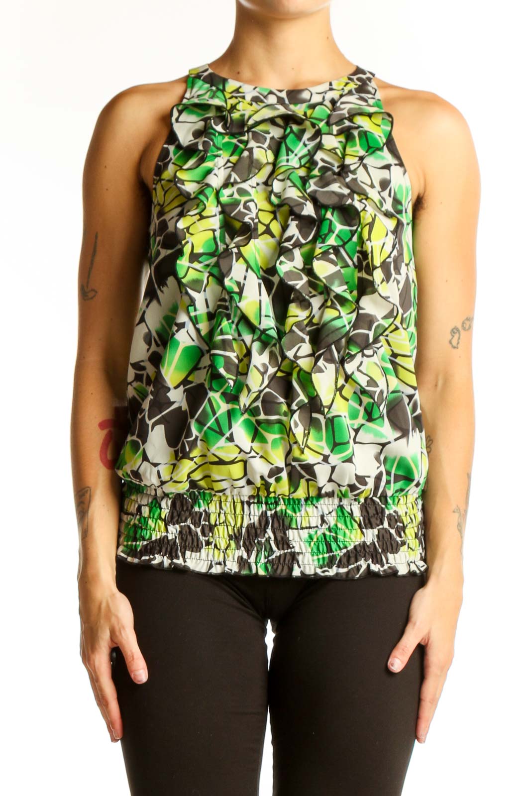 Front view of green floral ruffled sleeveless top from The Limited
