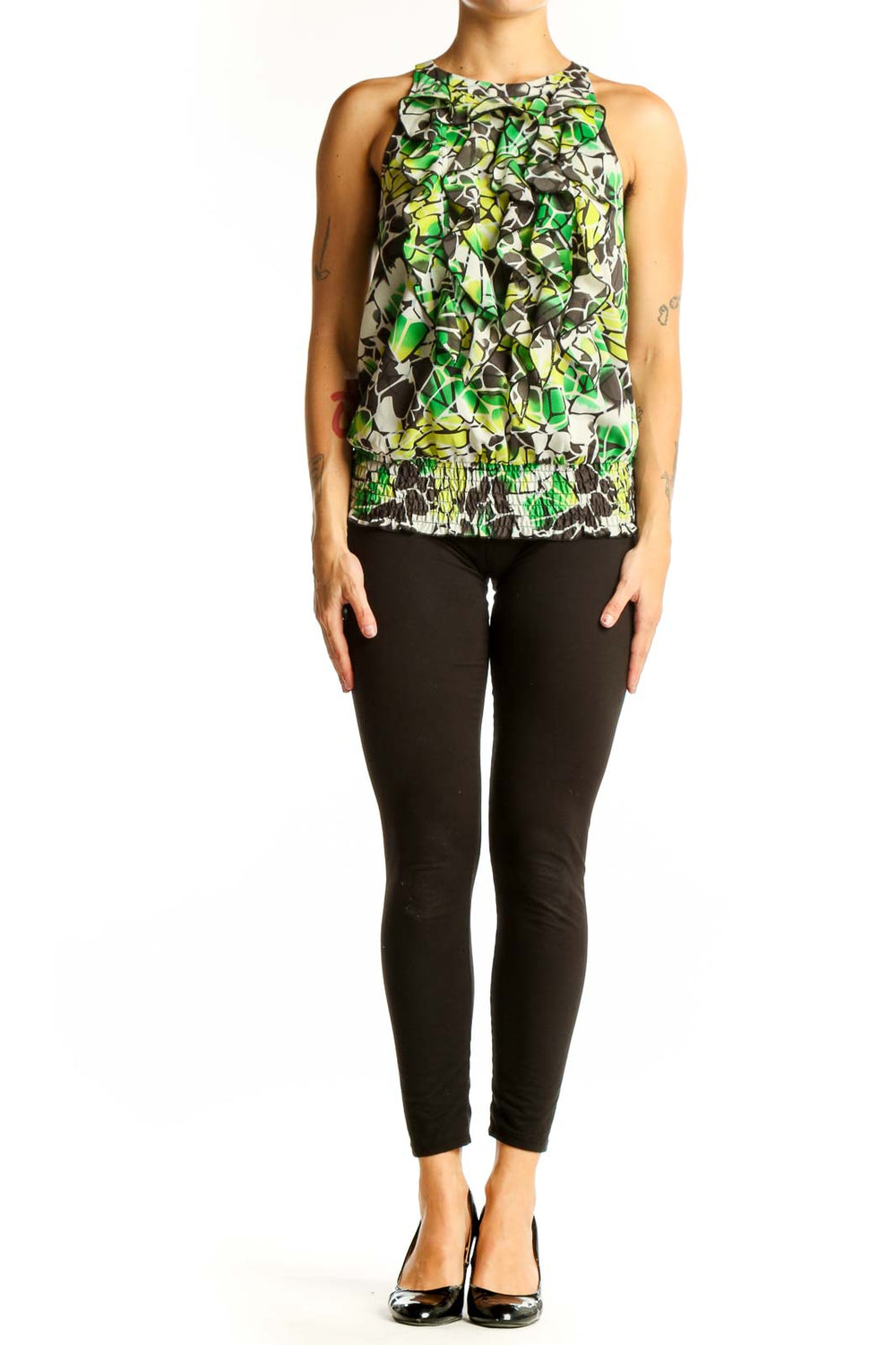 Front view of green floral ruffled sleeveless top from The Limited