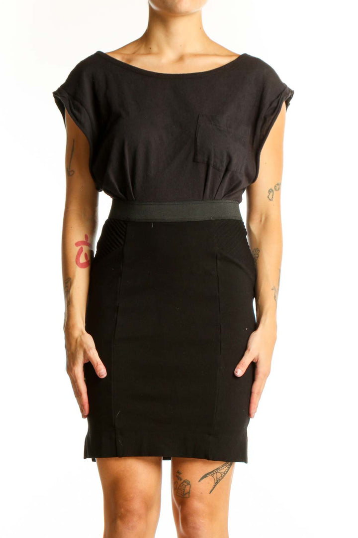 Front view of Free People black fitted dress with boat neckline and cap sleeves