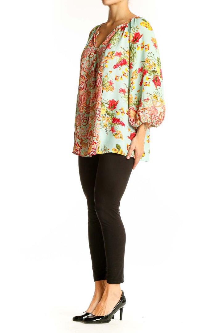 Front view of Olive Hill mint floral paisley blouse with bishop sleeves