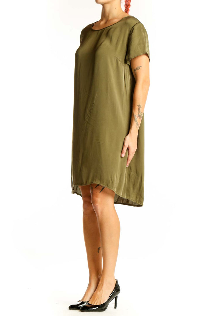 Front view of olive Quince t-shirt dress with relaxed fit