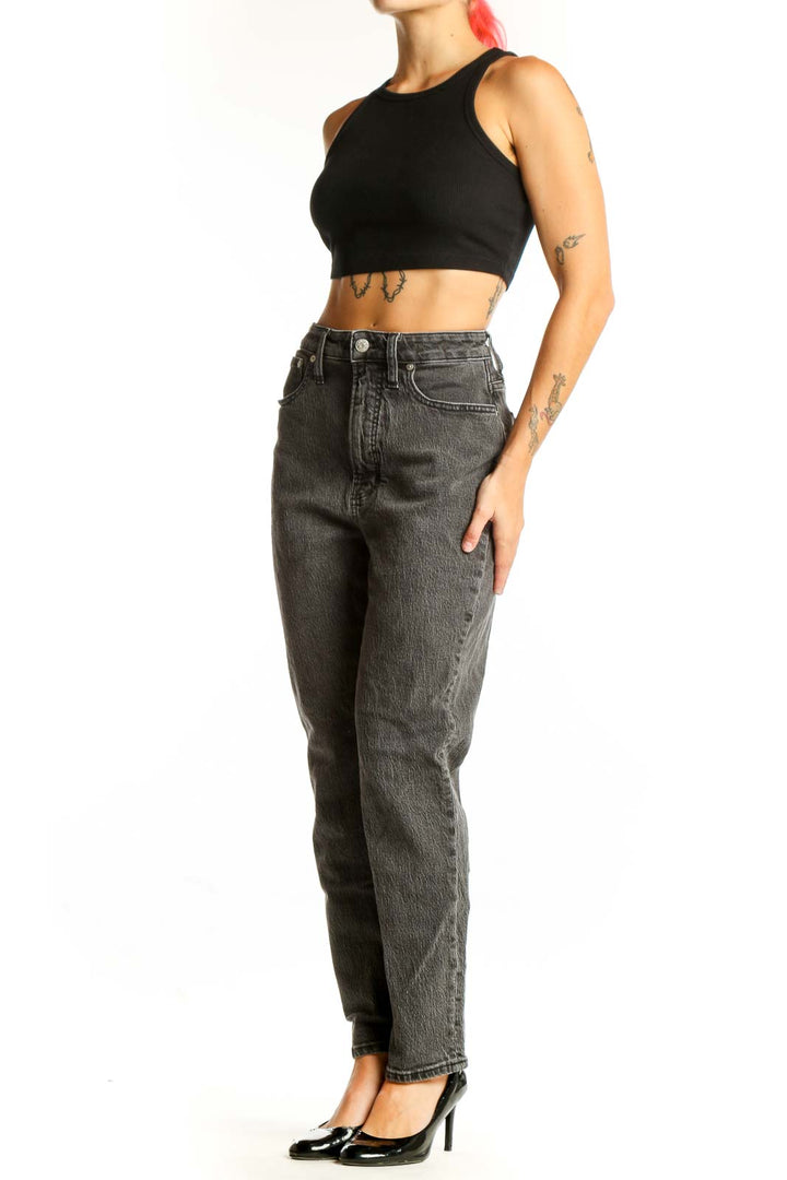 Front view of Madewell gray high-waisted straight leg jeans on model