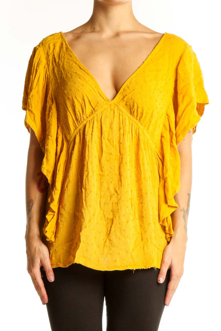 Front view of yellow KORI America V-neck top with flutter sleeves