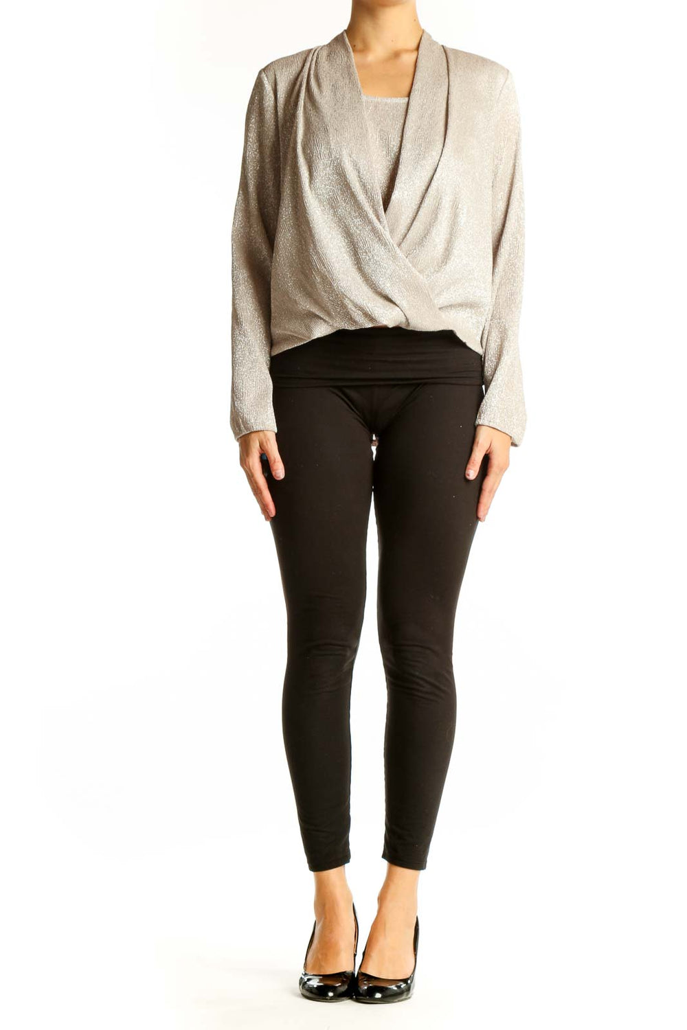 Front view of Alfani beige shimmering wrap-style blouse on model