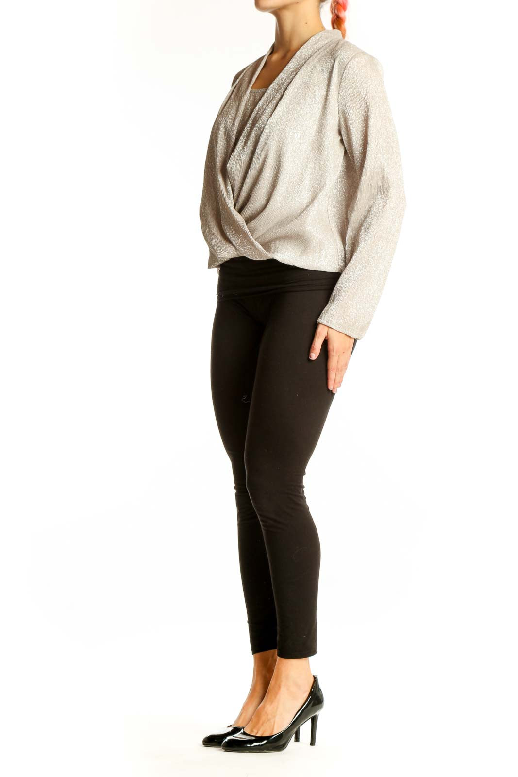 Front view of Alfani beige shimmering wrap-style blouse on model