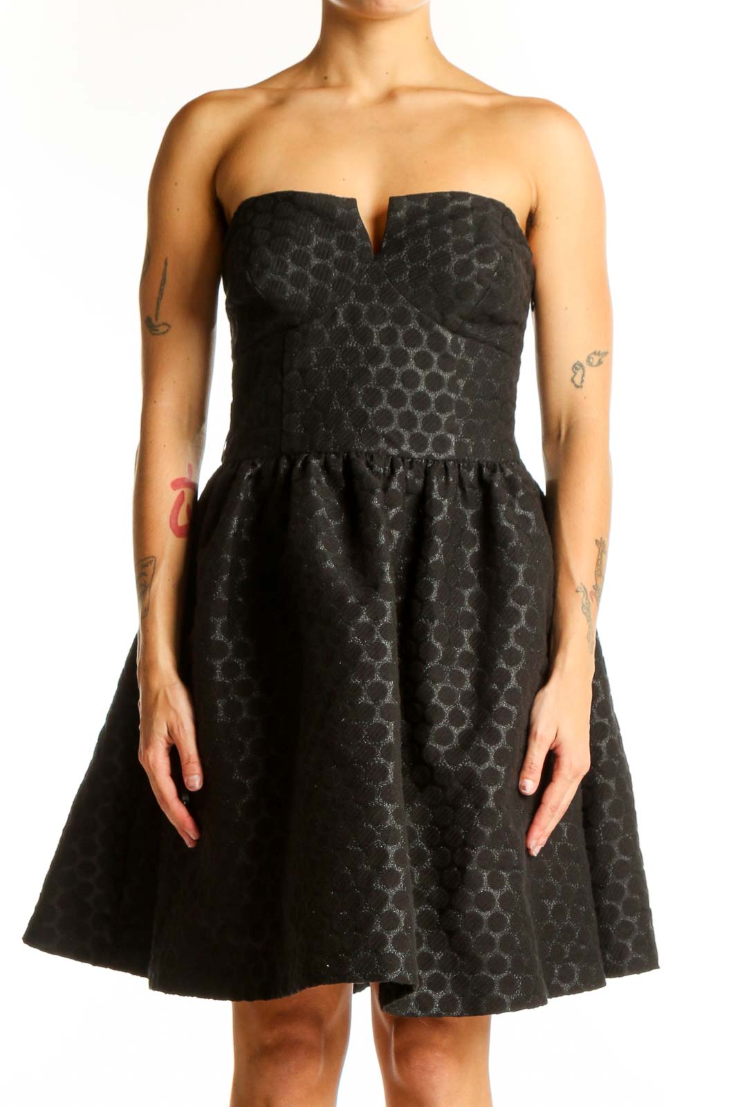 Front view of Wendy Katlen black polka dot strapless cocktail dress with full skirt