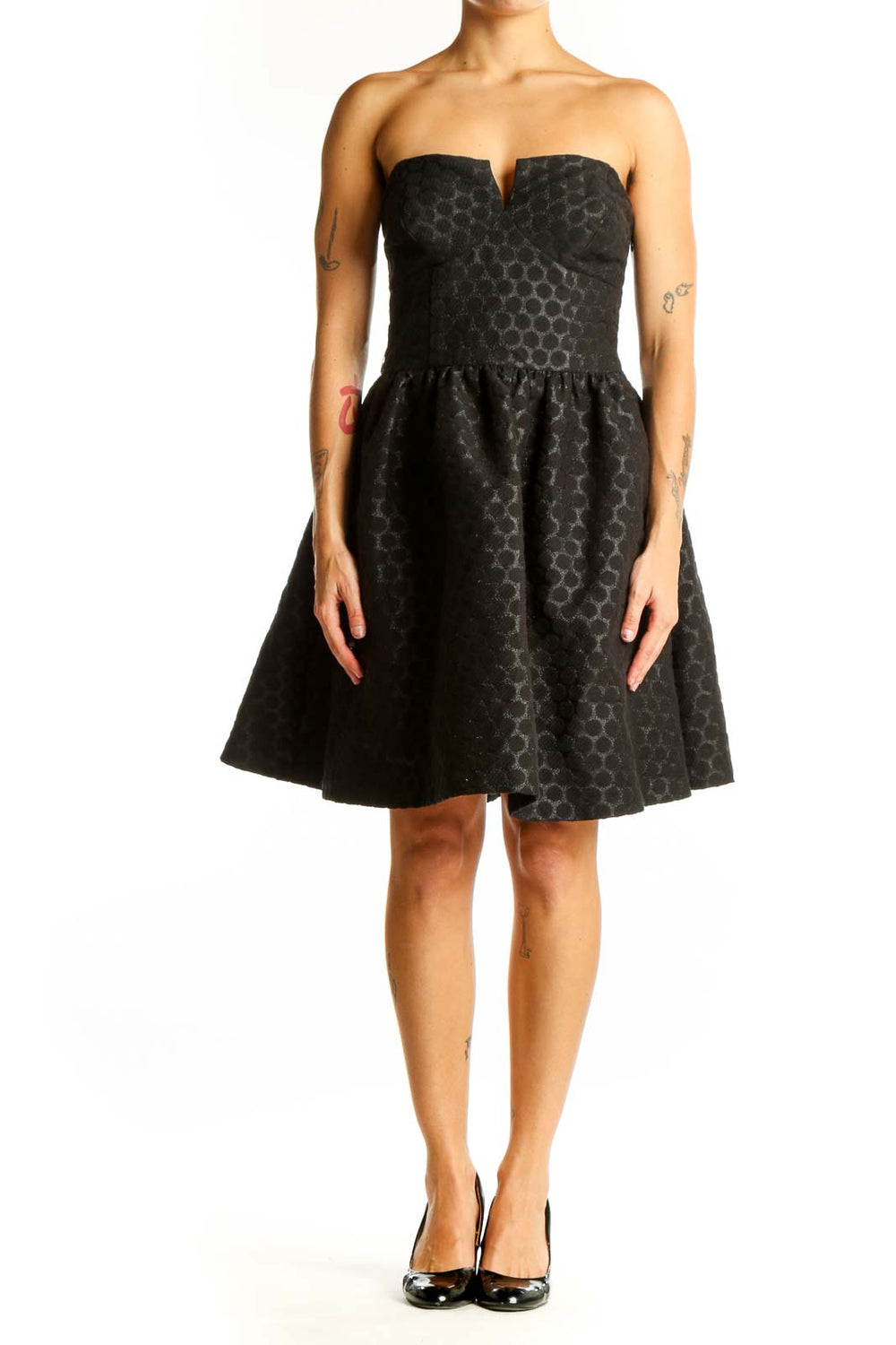 Front view of Wendy Katlen black polka dot strapless cocktail dress with full skirt