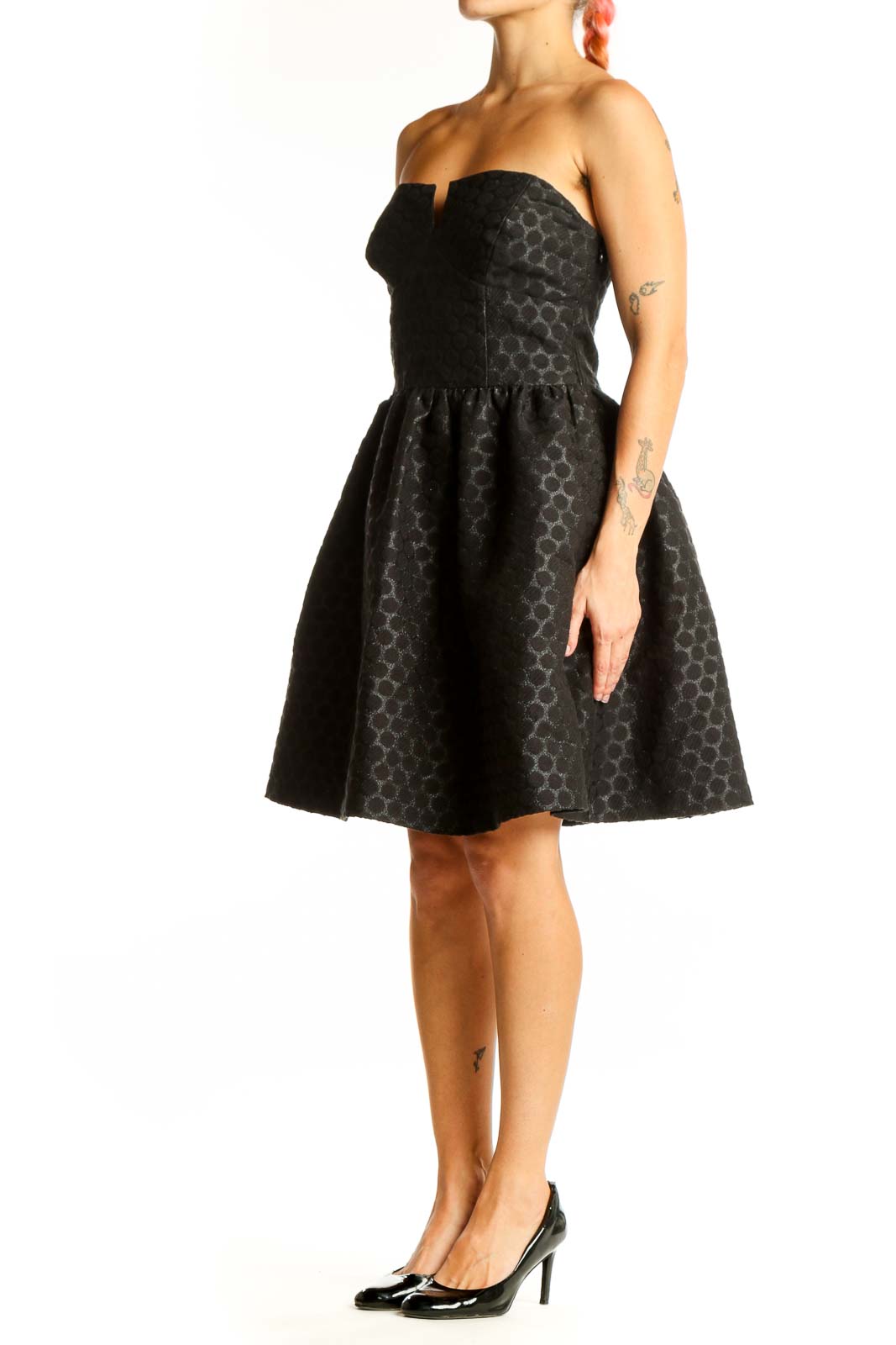 Front view of Wendy Katlen black polka dot strapless cocktail dress with full skirt