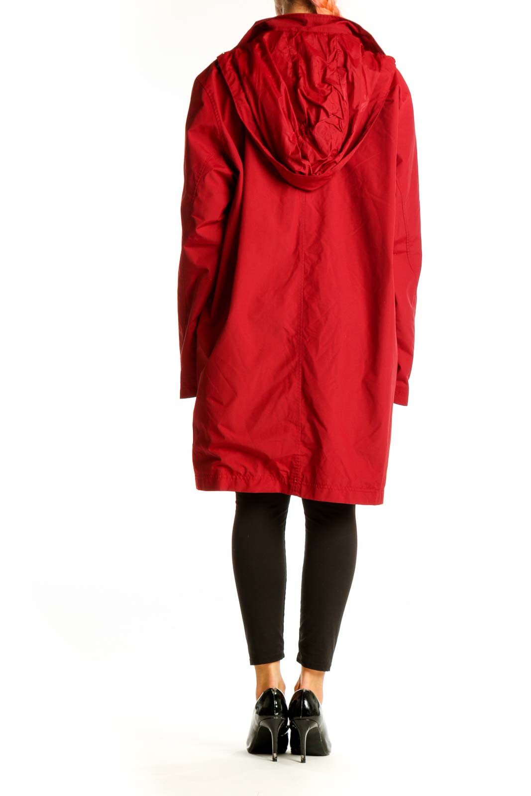 Side view of red Eddie Bauer nylon jacket showing length and fit
