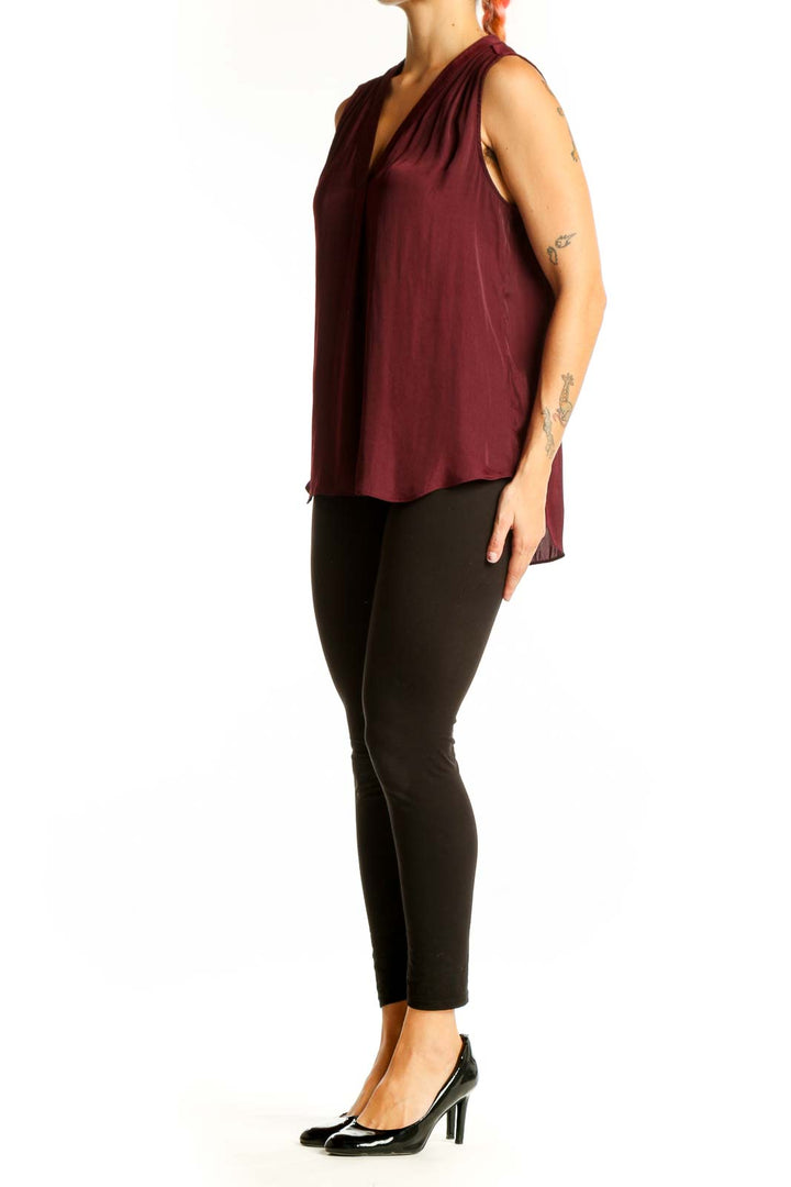 Front view of Vince Camuto burgundy sleeveless V-neck top