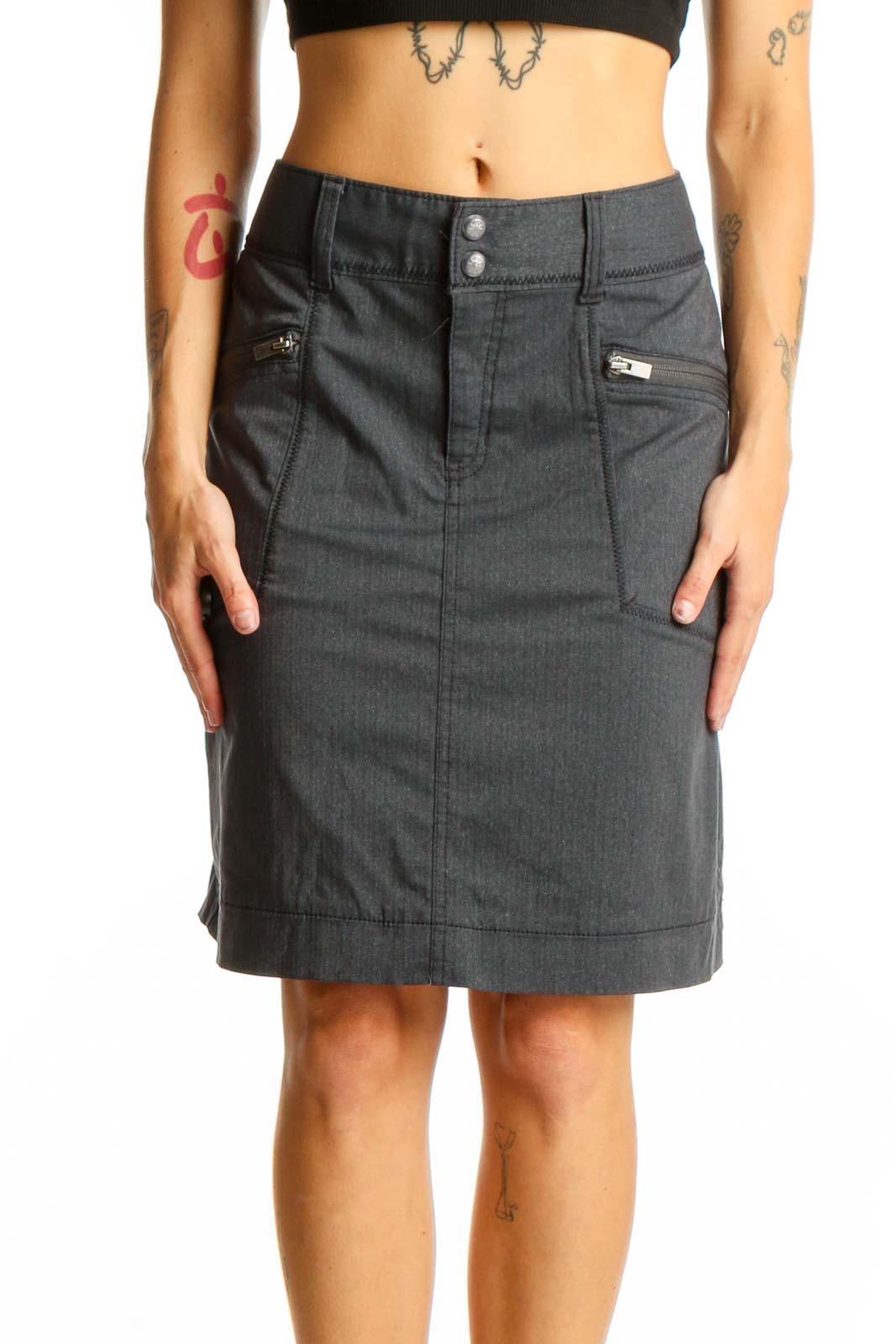 Front view of gray Athleta A-line skirt with zippered pockets