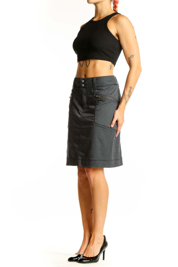 Front view of gray Athleta A-line skirt with zippered pockets