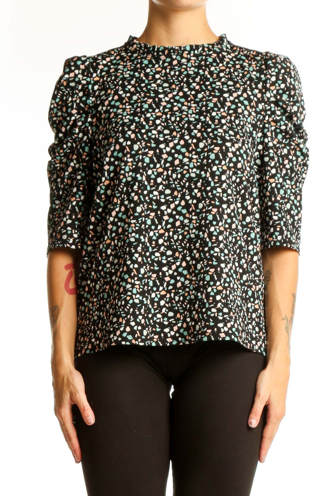 Front view of Melloday black floral print top with puff sleeves