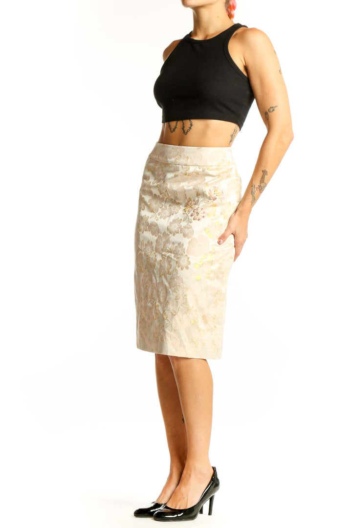 Front view of cream floral embroidered pencil skirt from Banana Republic