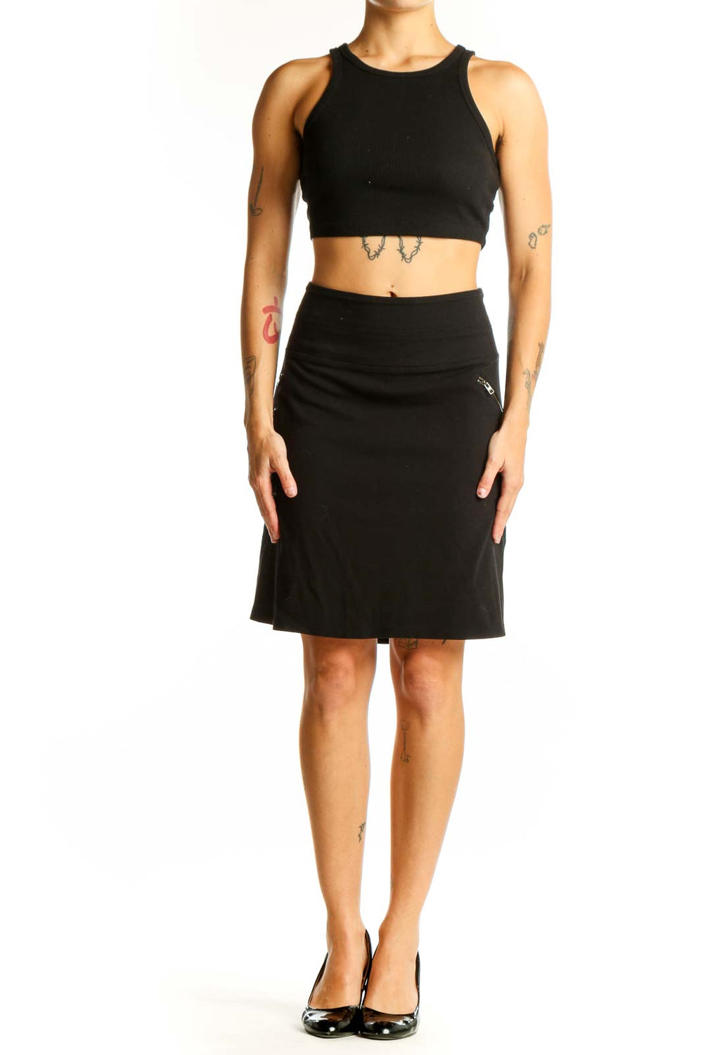 Front view of black Athleta A-line skirt with zipper pocket