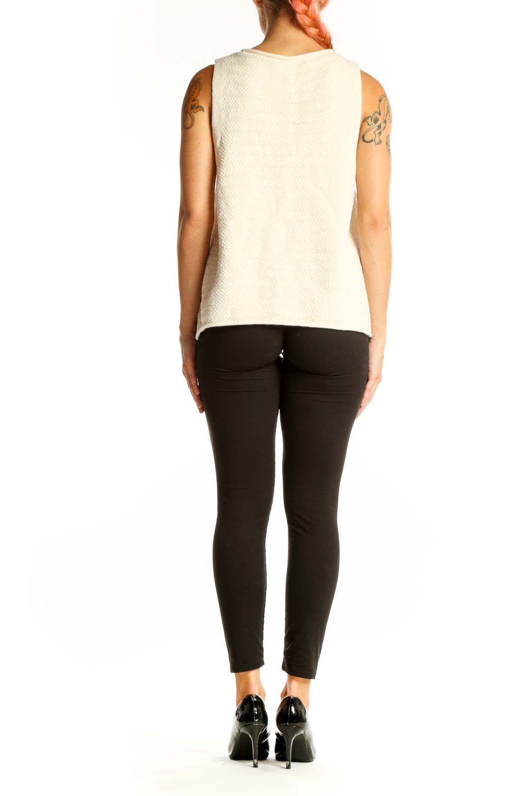 Side view of Madewell cream textured sleeveless knit top on model