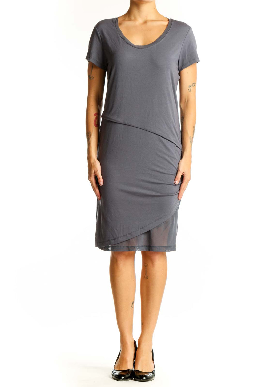 Front view of gray Halcyon dress with asymmetrical hem and ruching