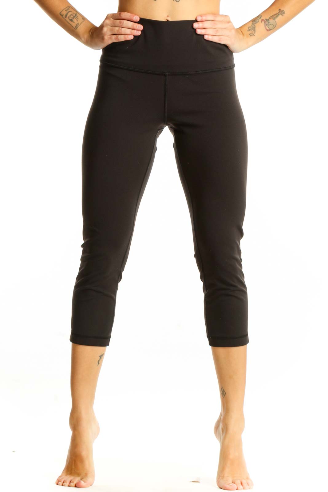 Front view of black Lululemon high-waisted capri leggings