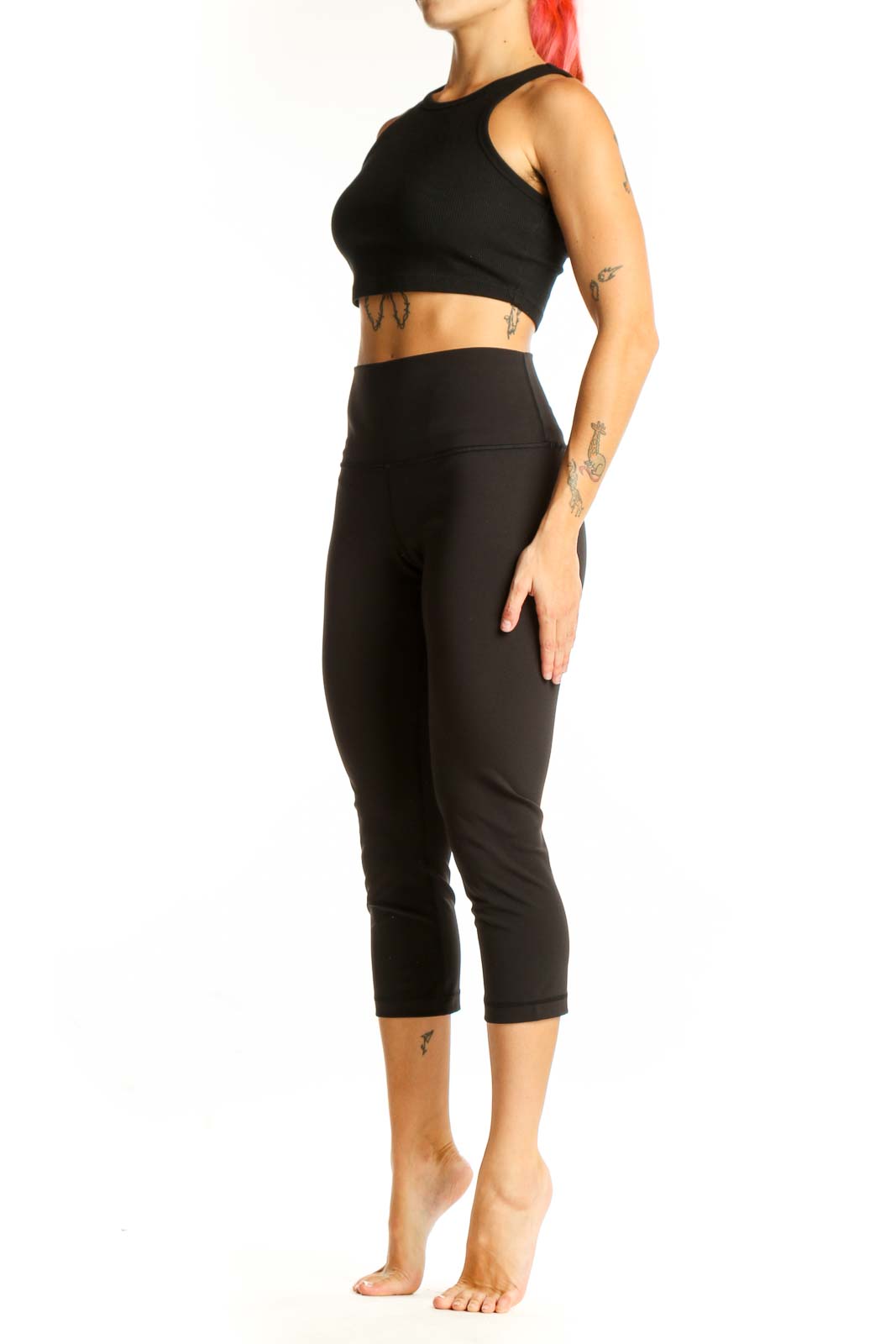 Front view of black Lululemon high-waisted capri leggings