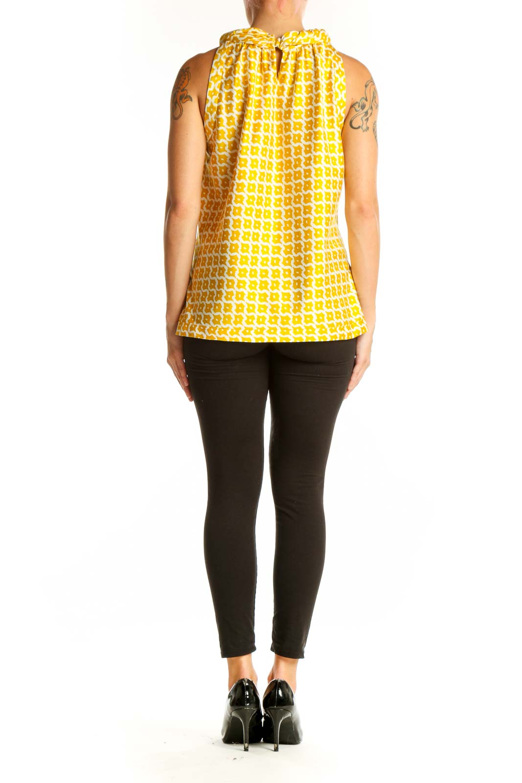 Side view of Banana Republic yellow geometric print sleeveless top on model