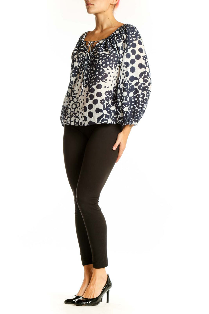 Front view of Trina Turk Navy and White Floral Print Peasant Top