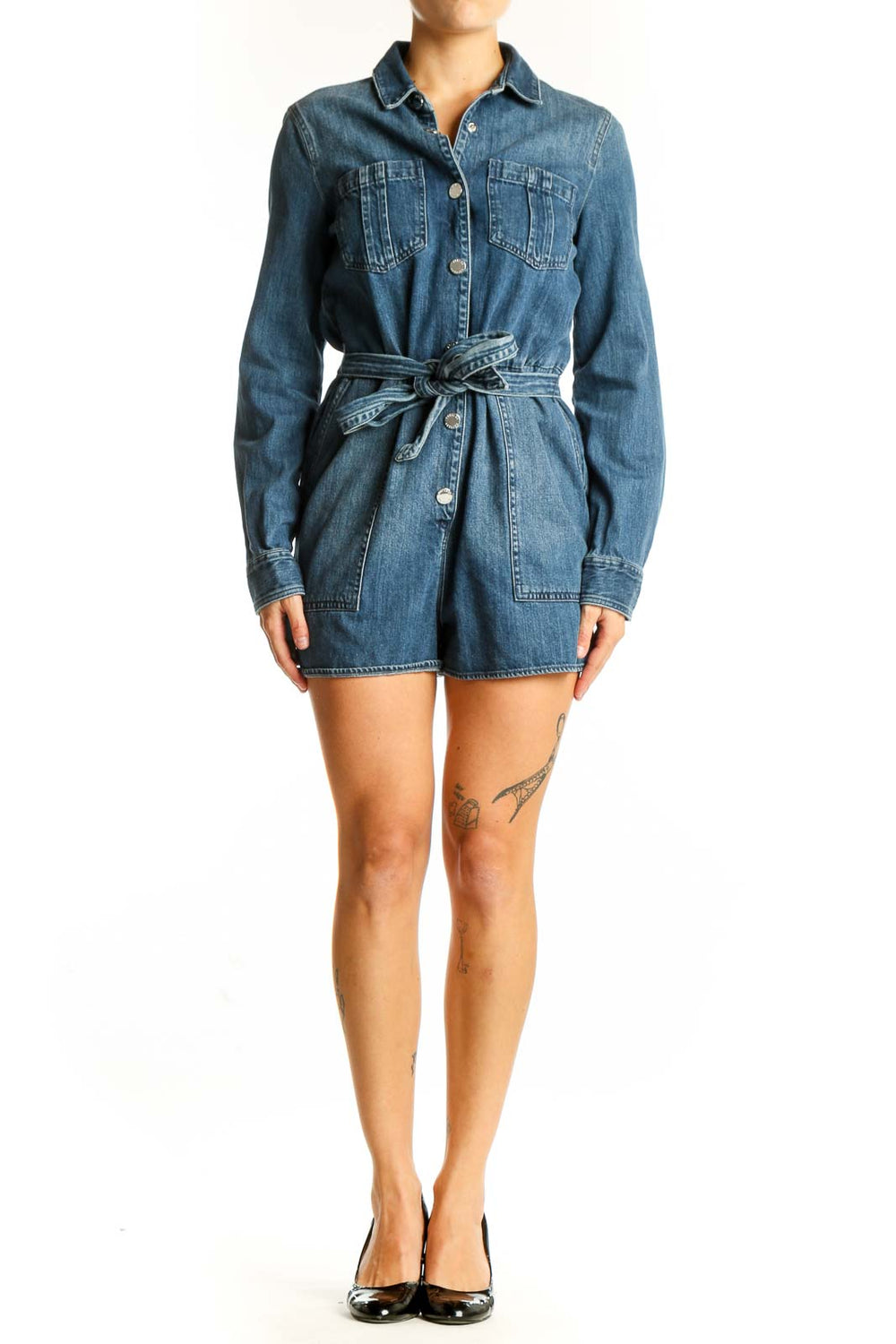 Front view of Express blue denim button-up romper with belt