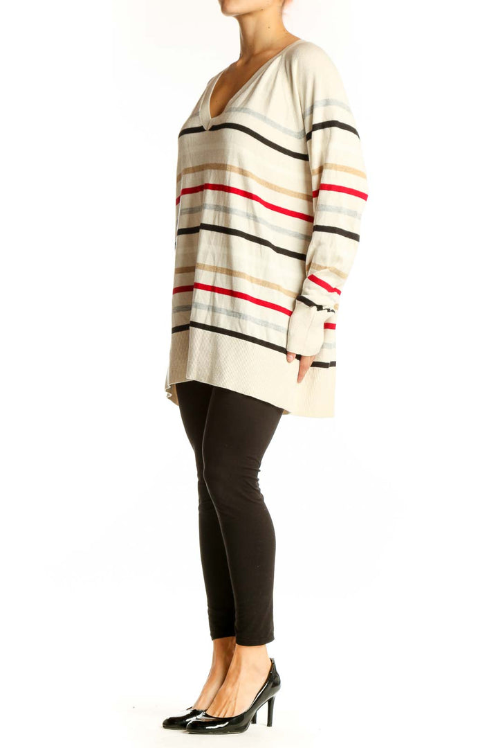 Front view of cream striped V-neck oversized sweater from LOFT