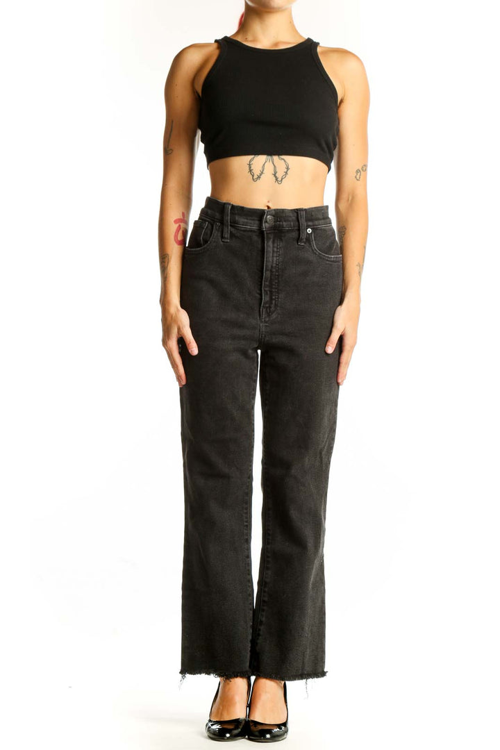 Front view of Madewell black high-waisted wide-leg jeans