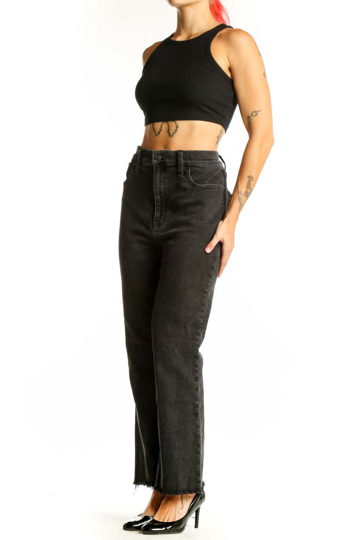 Front view of Madewell black high-waisted wide-leg jeans