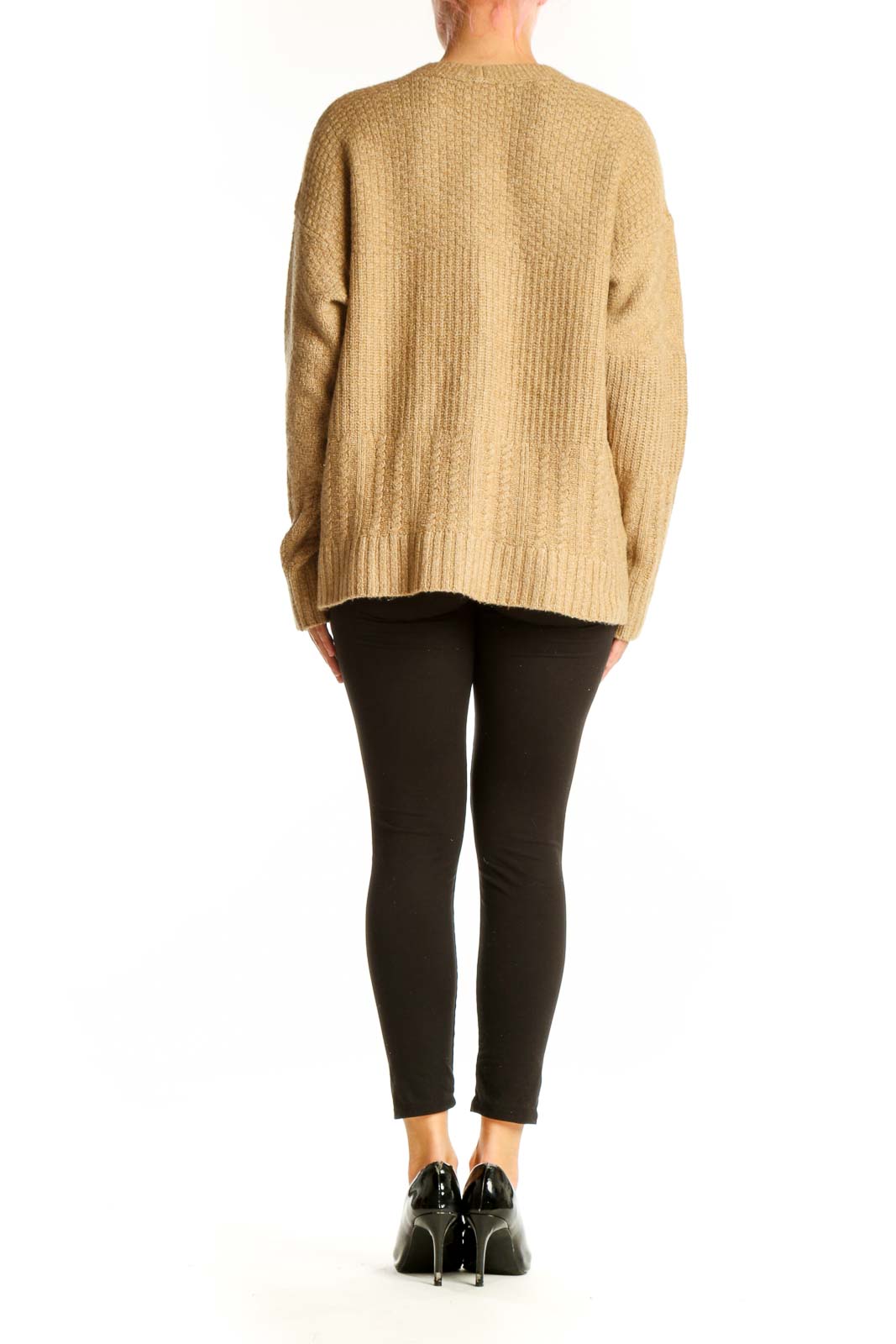 Side view of Cabi camel cable knit V-neck cardigan on model