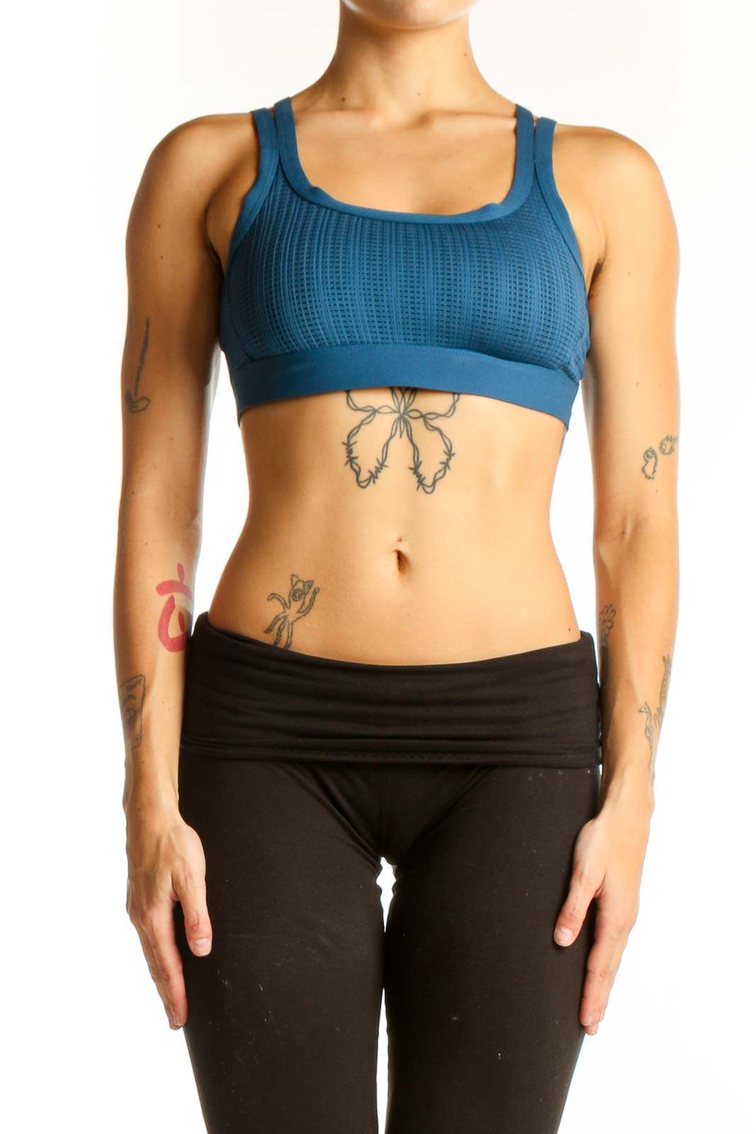 Front view of blue textured Under Armour racerback sports bra