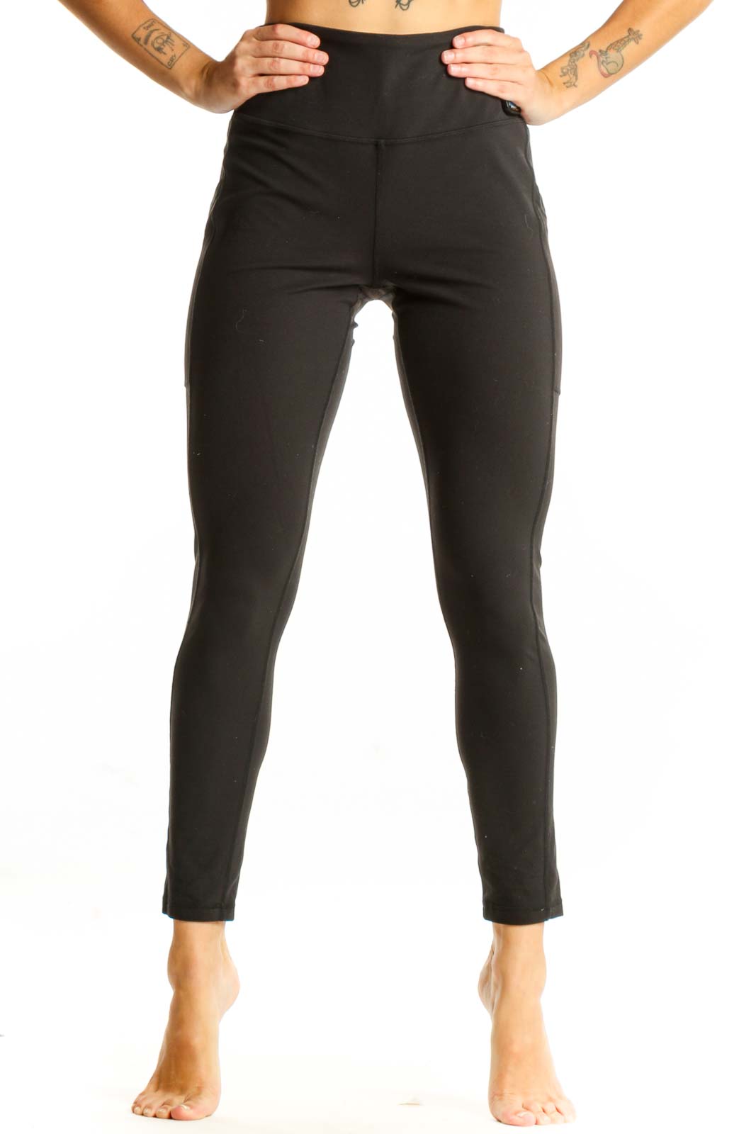 Front view of black high-waisted prAna performance leggings
