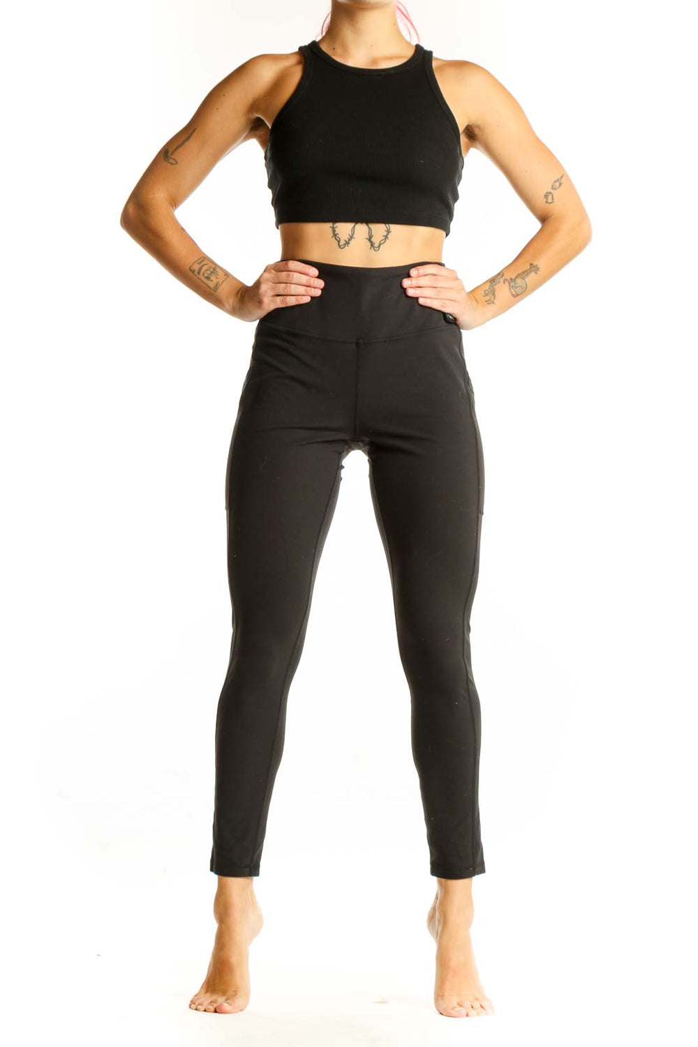 Front view of black high-waisted prAna performance leggings