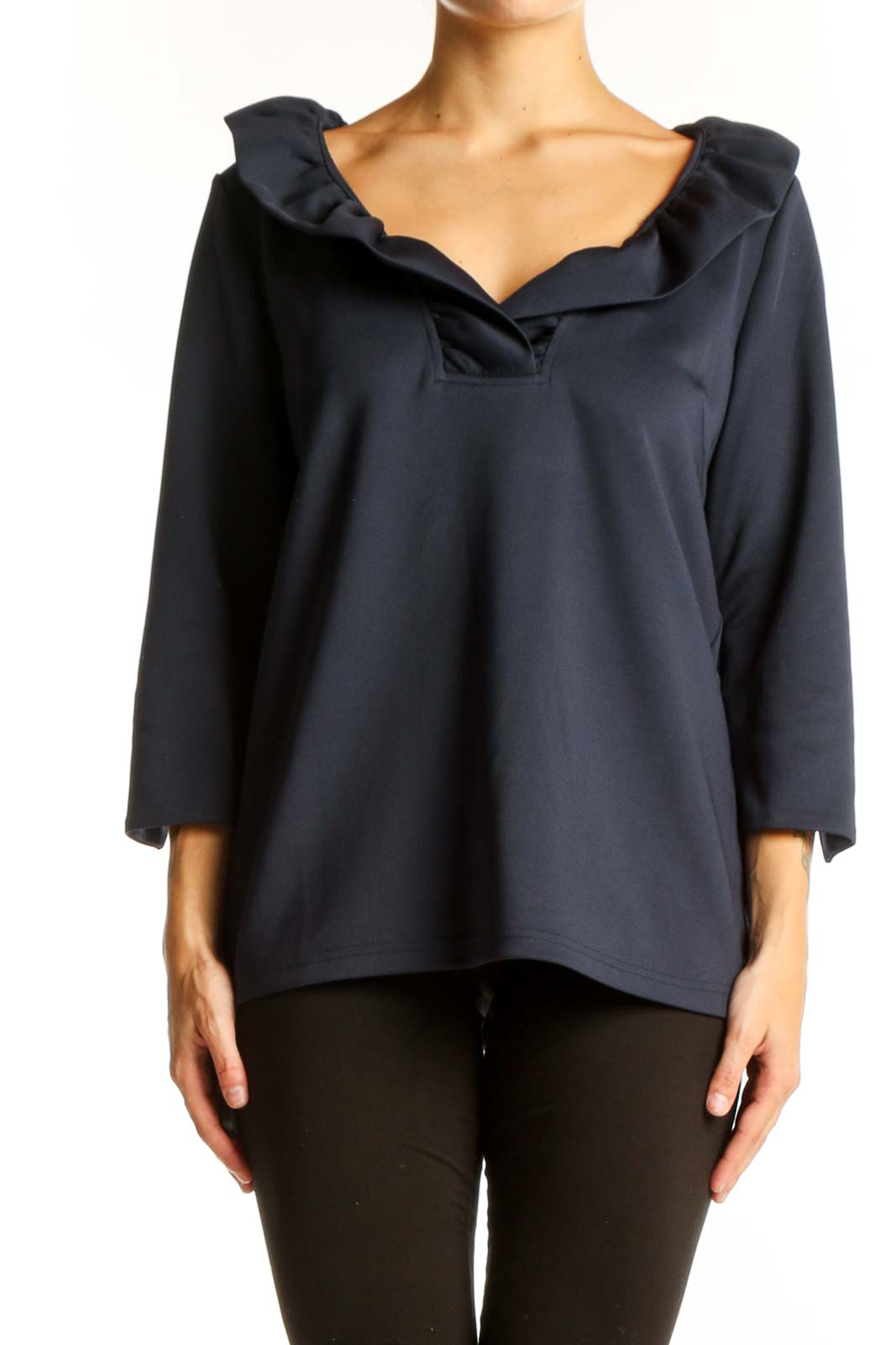 Front view of navy ruffled V-neck blouse by Gretchen Scott Designs