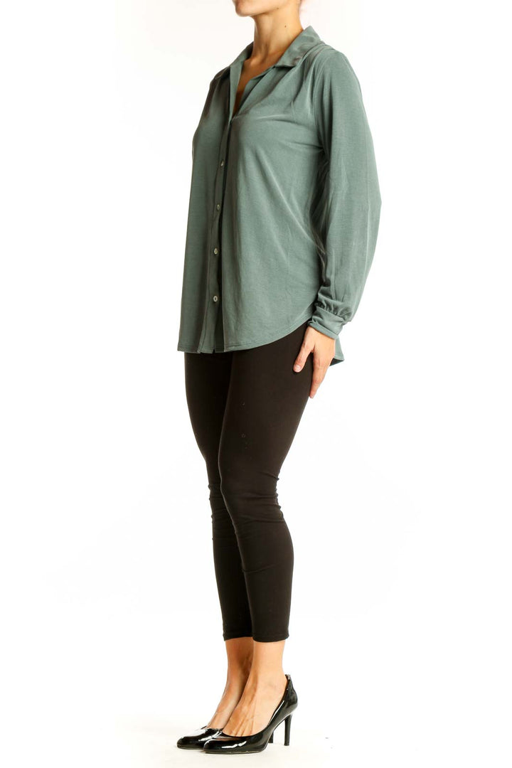 Front view of sage green long sleeve button-down blouse by Green Envelope