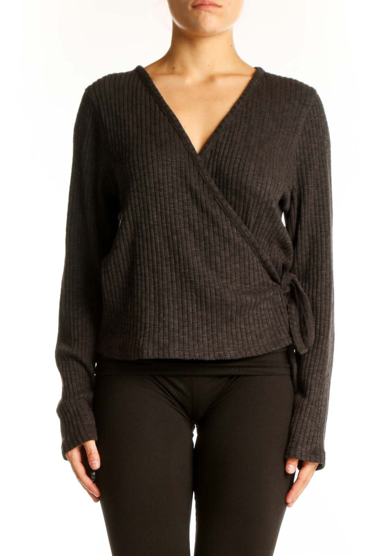 Front view of Everlane charcoal ribbed wrap sweater with V-neck