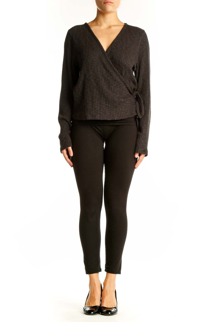 Front view of Everlane charcoal ribbed wrap sweater with V-neck