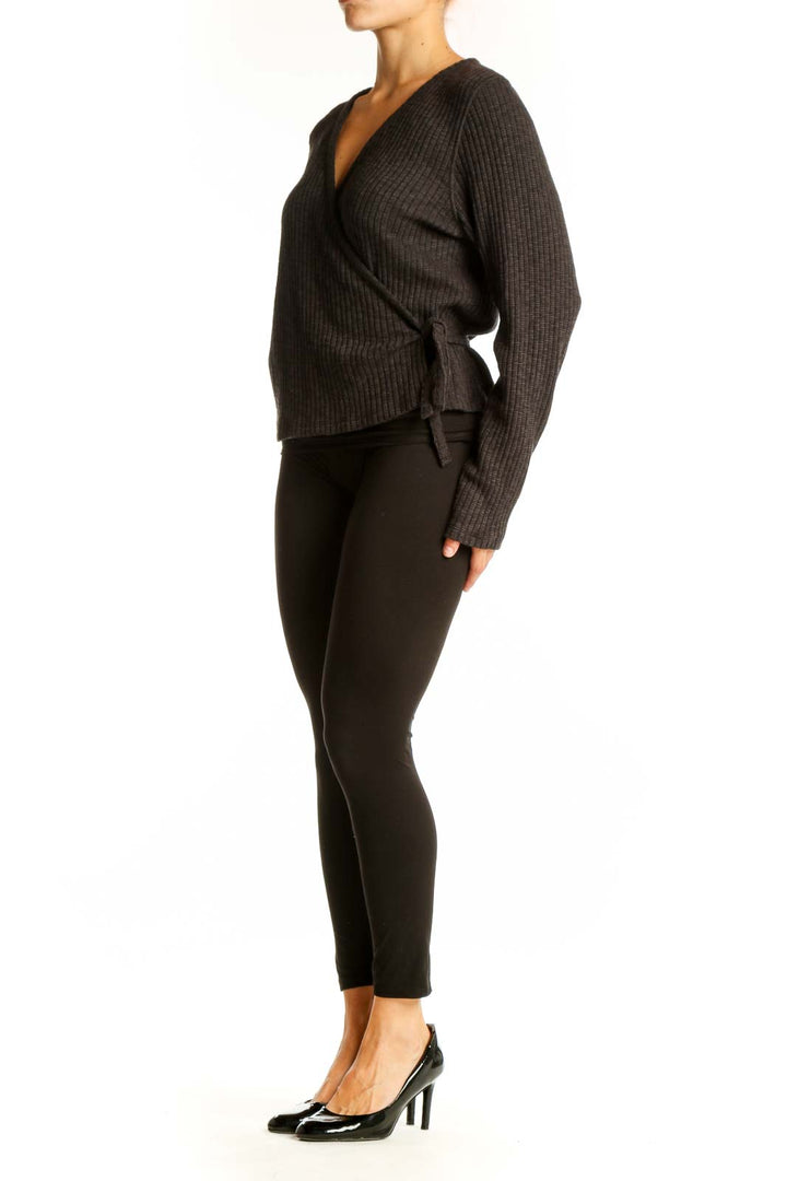 Front view of Everlane charcoal ribbed wrap sweater with V-neck