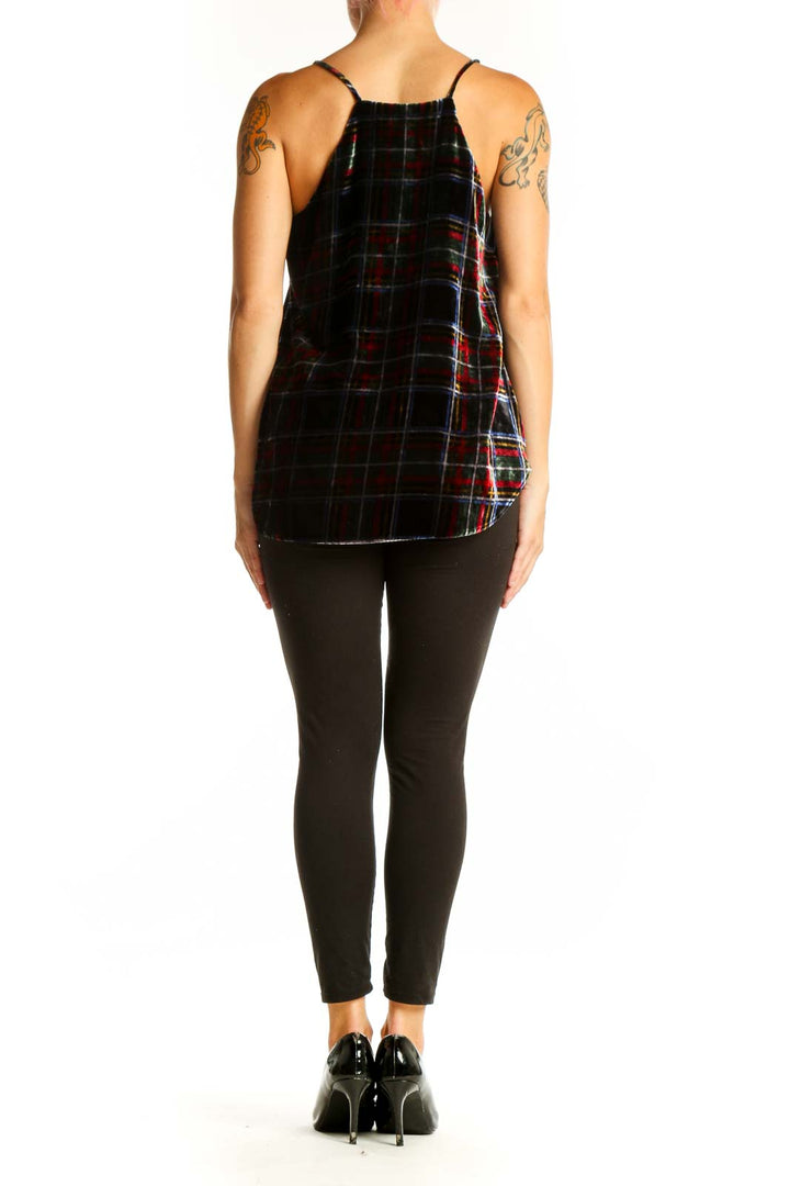 Side view of LOFT black plaid velvet camisole top showing drape and length