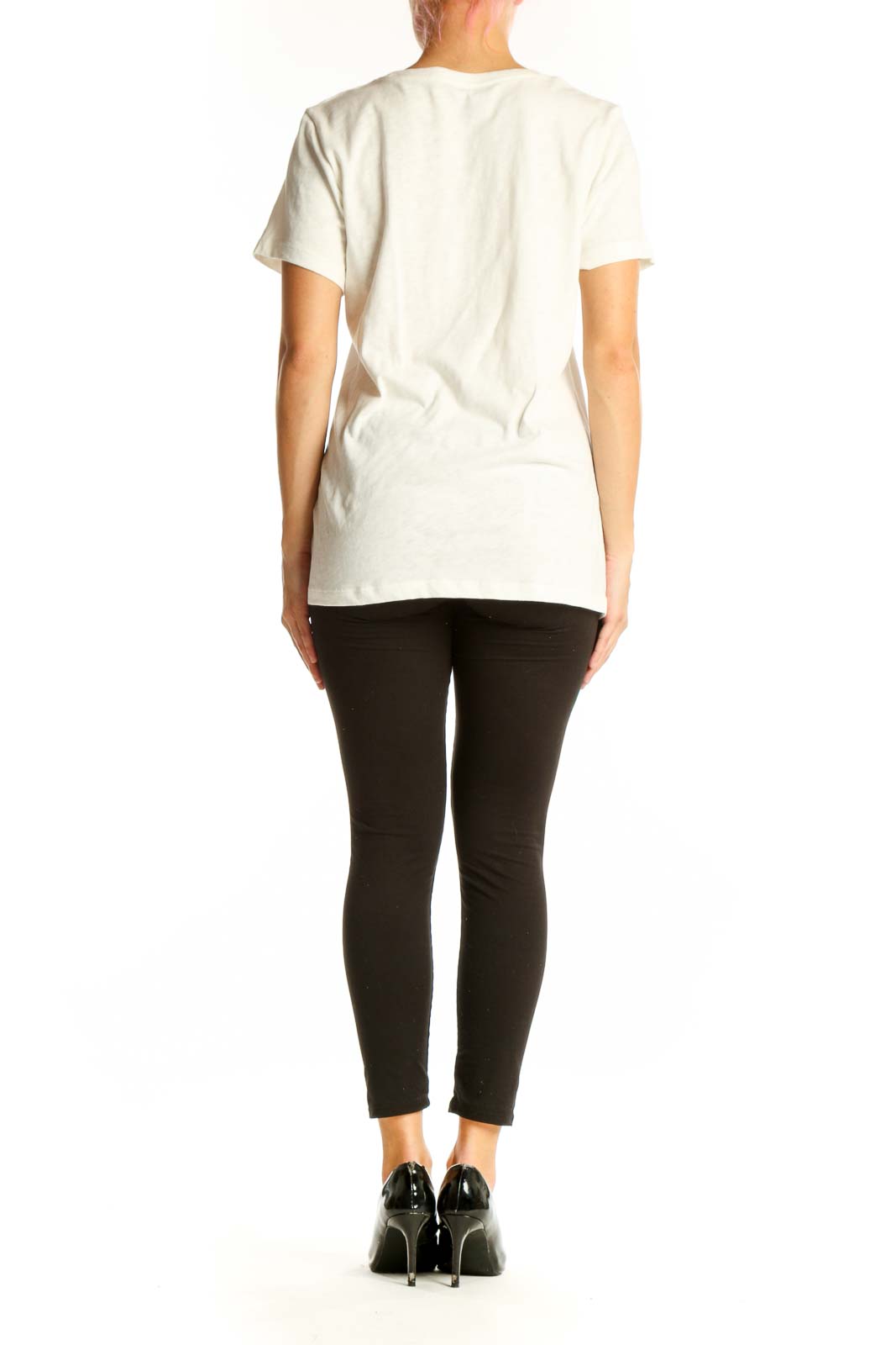 Side view of model wearing white J.Crew t-shirt with dachshund graphic