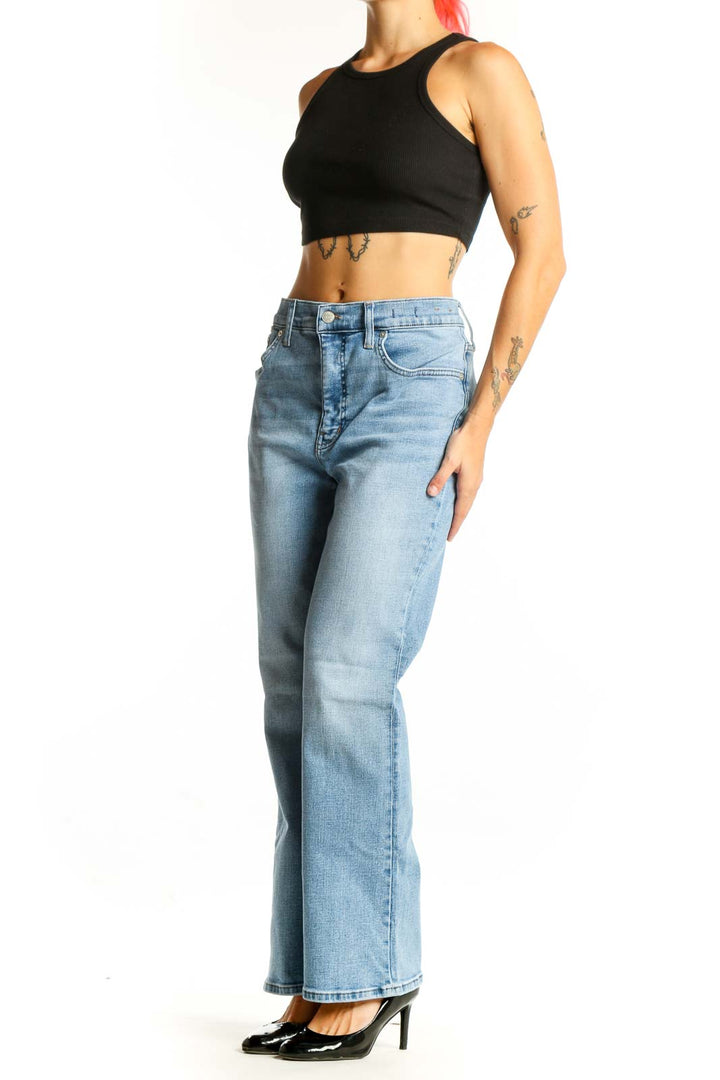 Front view of Madewell light blue high-waisted straight-leg jeans