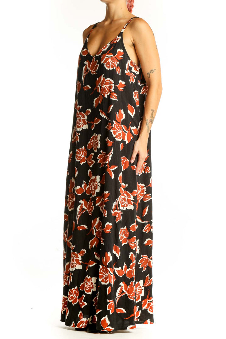 Front view of Vince Camuto black maxi dress with orange floral print