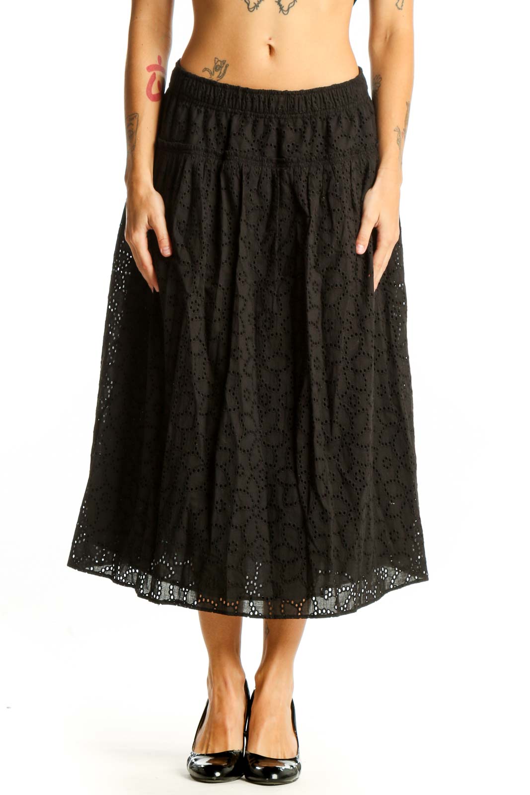 Front view of Madewell black eyelet lace cotton midi skirt
