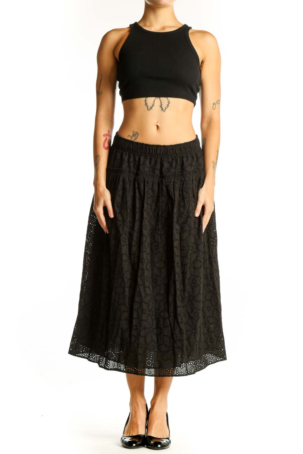 Front view of Madewell black eyelet lace cotton midi skirt