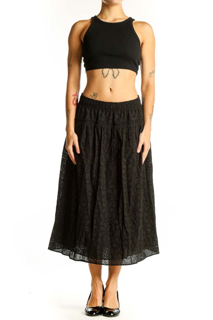 Front view of Madewell black eyelet lace cotton midi skirt
