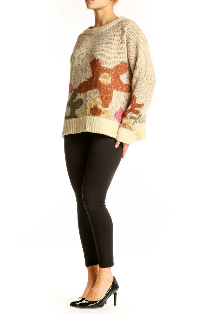Front view of Toad&Co beige knit sweater with floral pattern