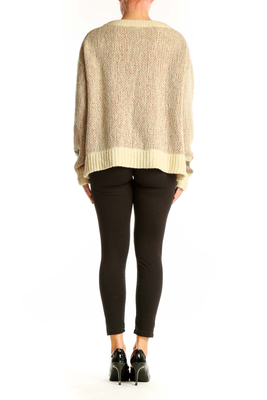 Side view of Toad&Co beige knit sweater showing floral design